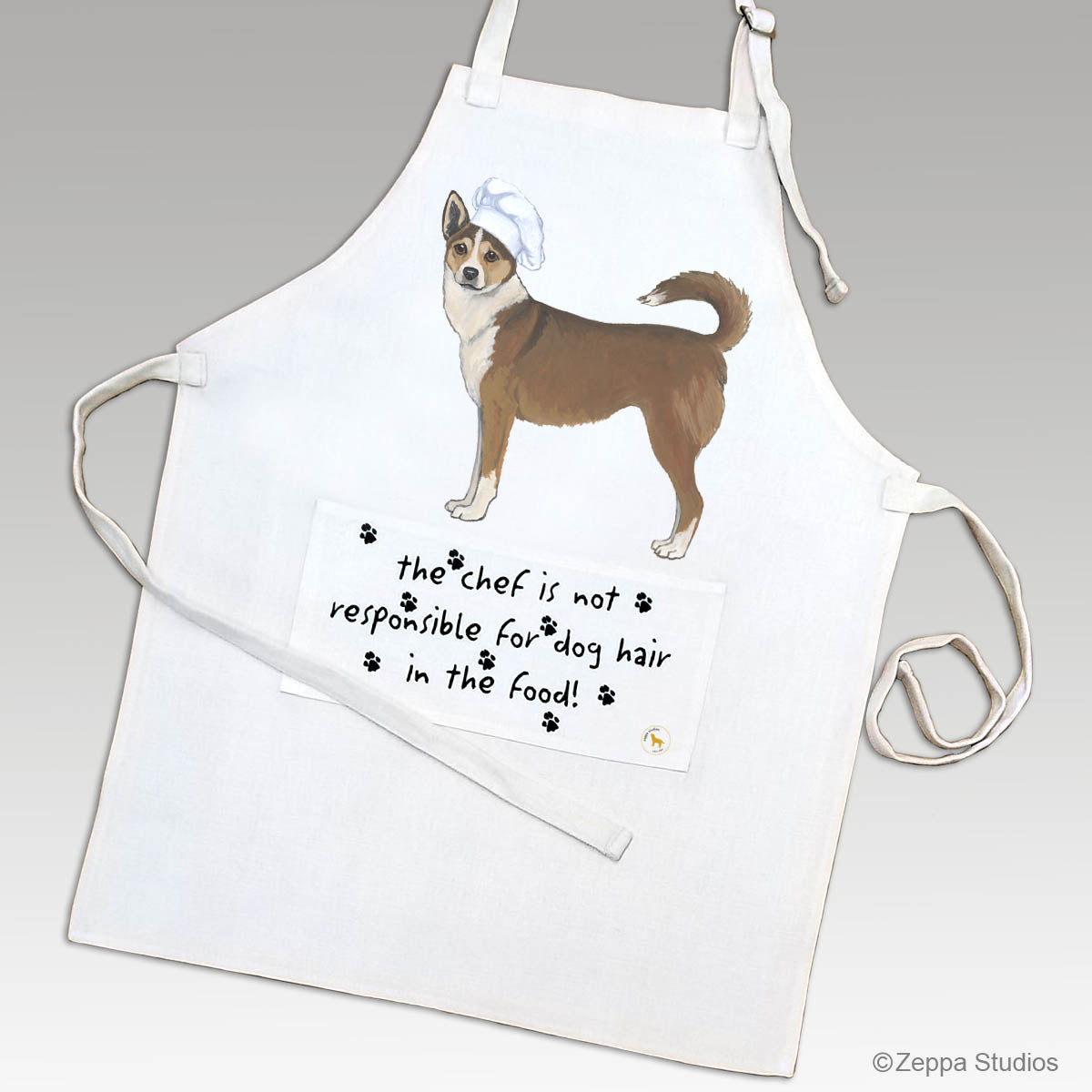 Norwegian Lundehund in a chef's hat design on an apron.
