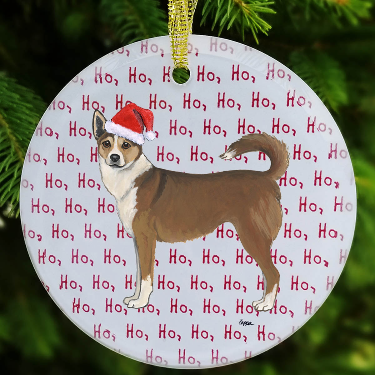 Norwegian Lundehund in a Santa hat on a glass Christmas ornament.
