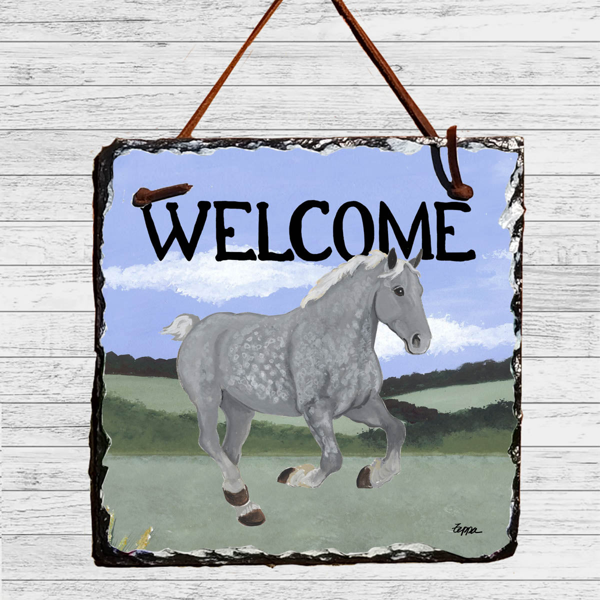 Percheron galloping on a slate welcome sign.