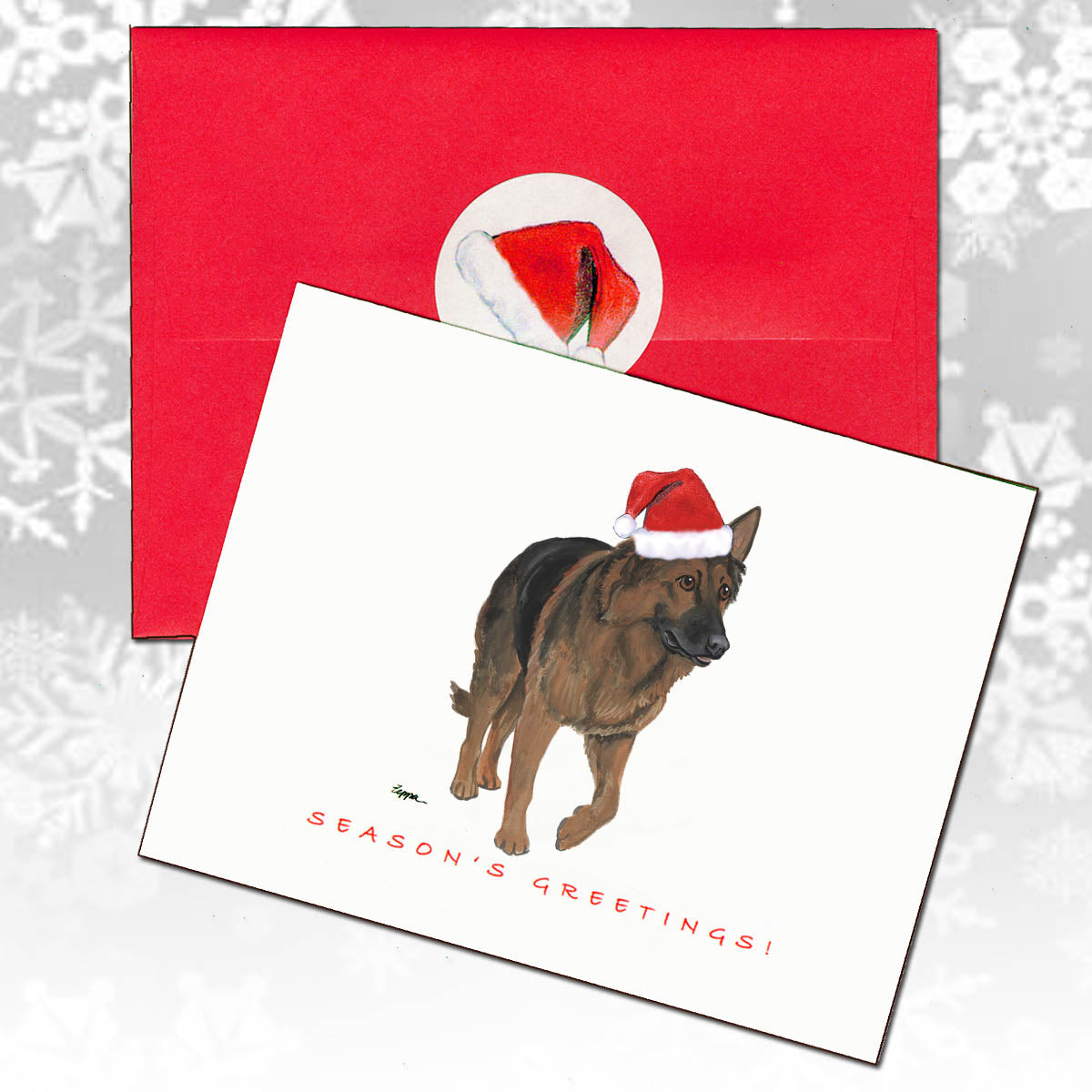 Christmas card with a Shiloh Shepherd wearing a Santa hat and a red envelope 