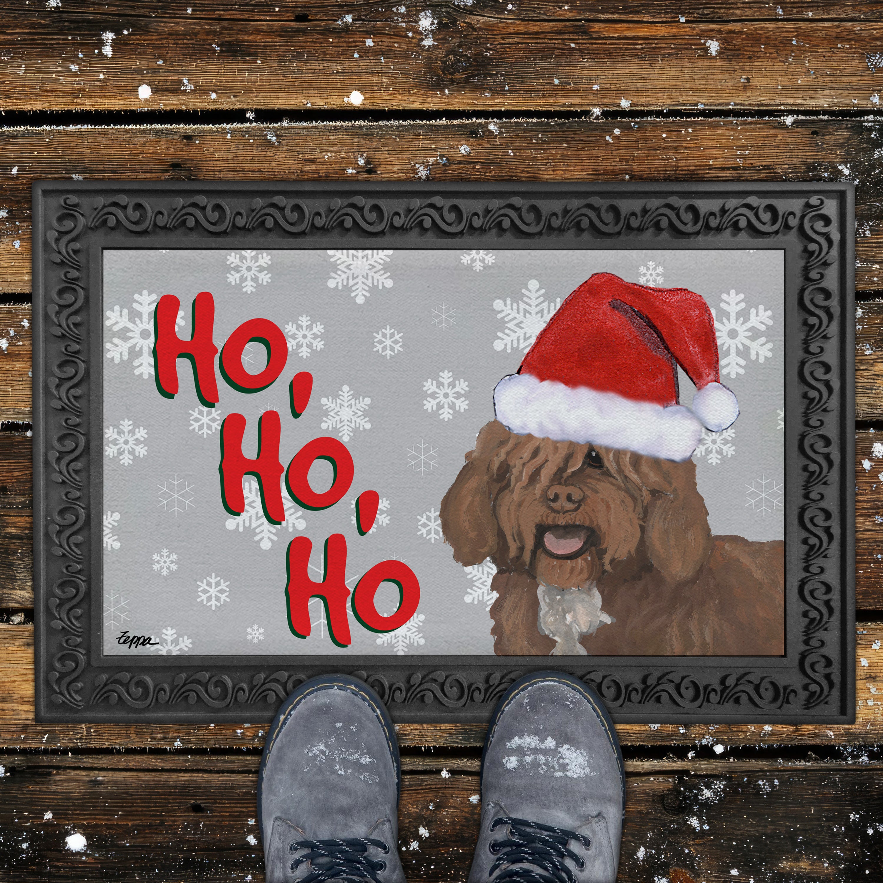 Doormat with a Spanish Water Dog wearing a Santa hat and 'Ho, Ho, Ho' text on a grey background.