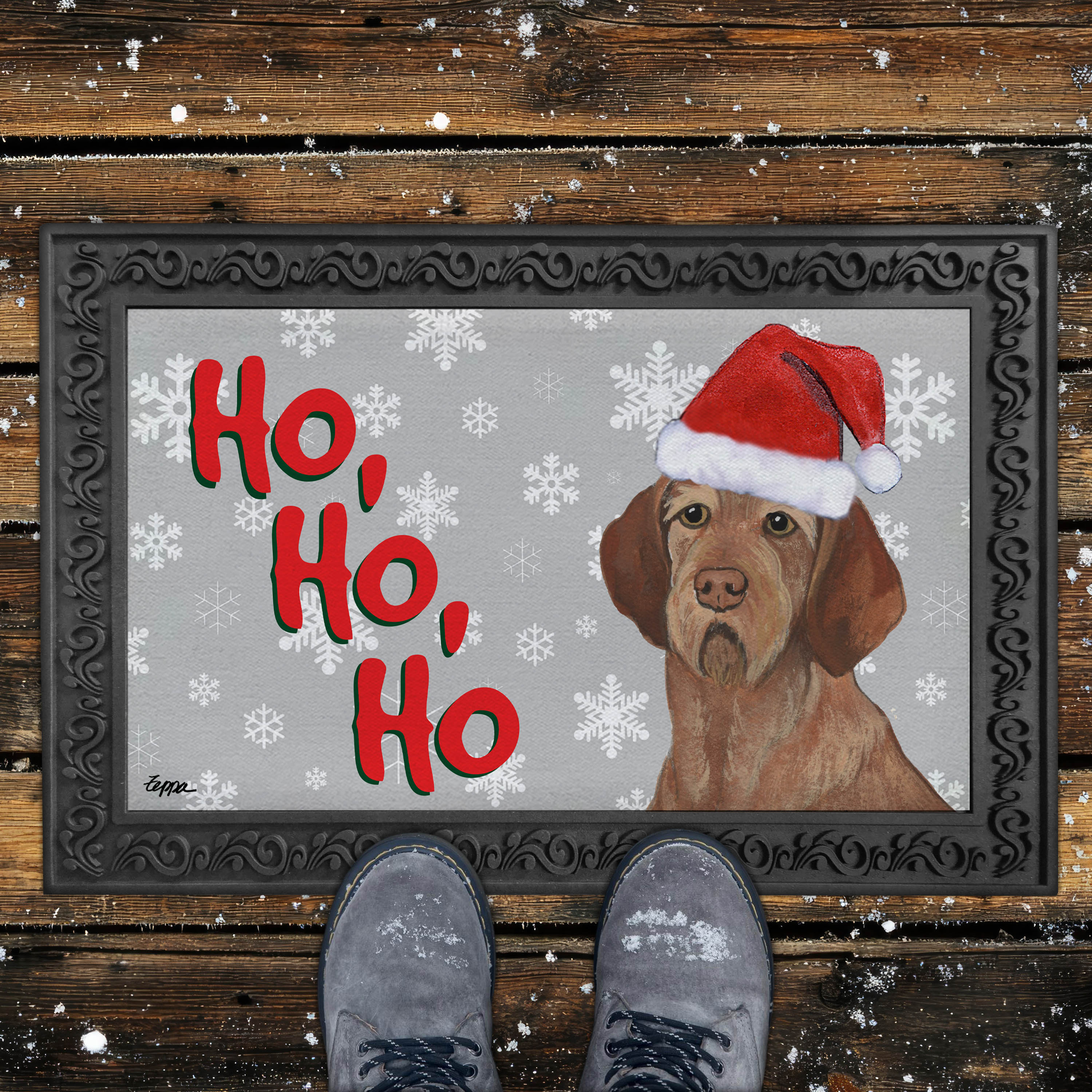 Christmas-themed door mat with a Wirehaired Vizsla wearing a Santa hat and snowflakes on a grey background.