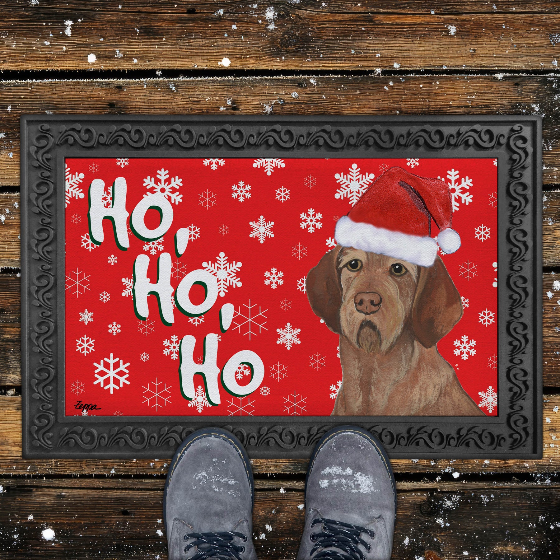 Christmas-themed door mat with a Wirehaired Vizsla wearing a Santa hat and snowflakes on a red background.