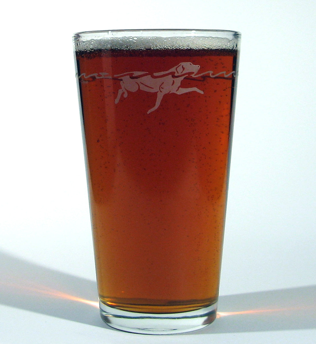 A pint of your favorite brew in our Waterdog Classic Pub Glass.